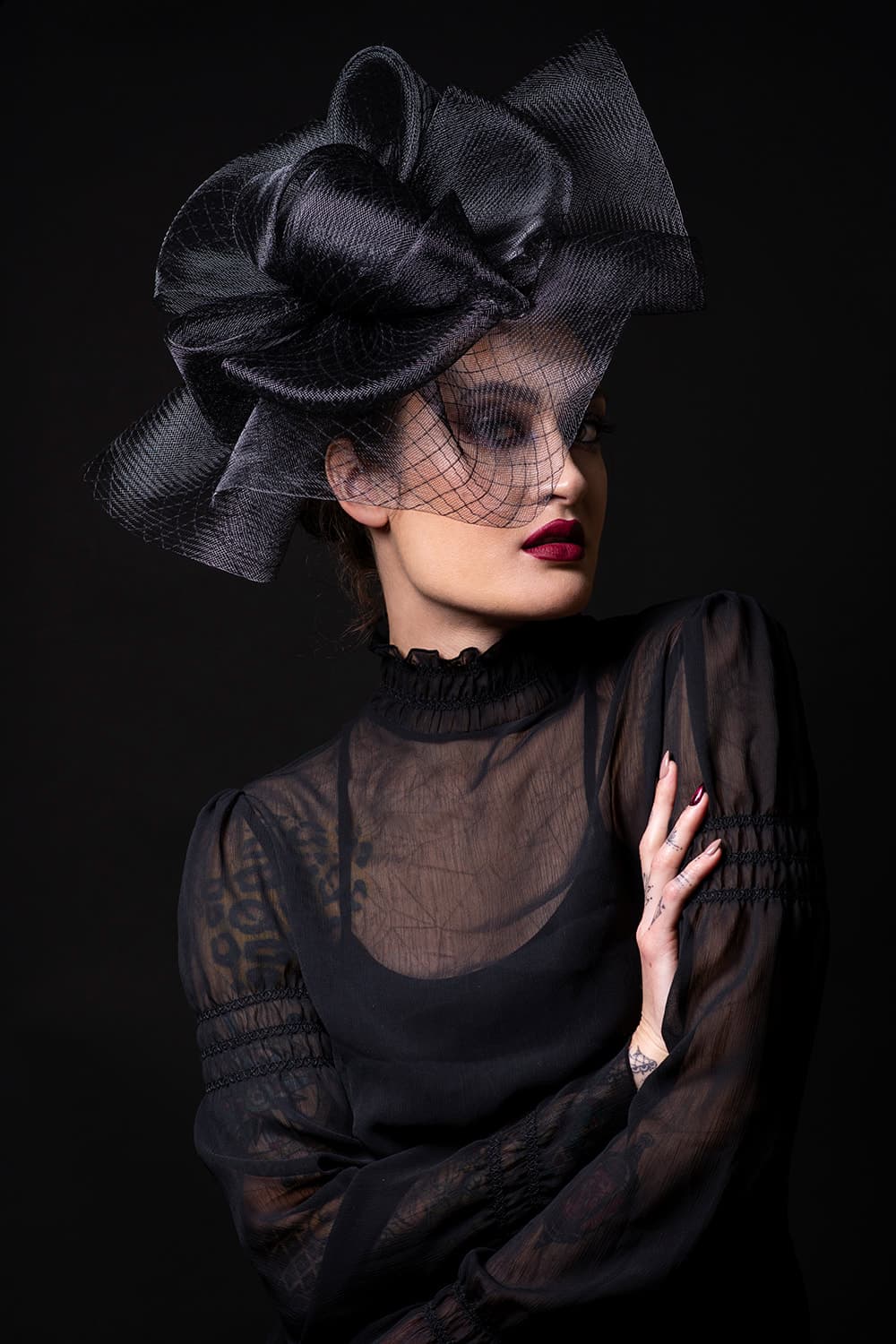 Fashion portrait with black hat