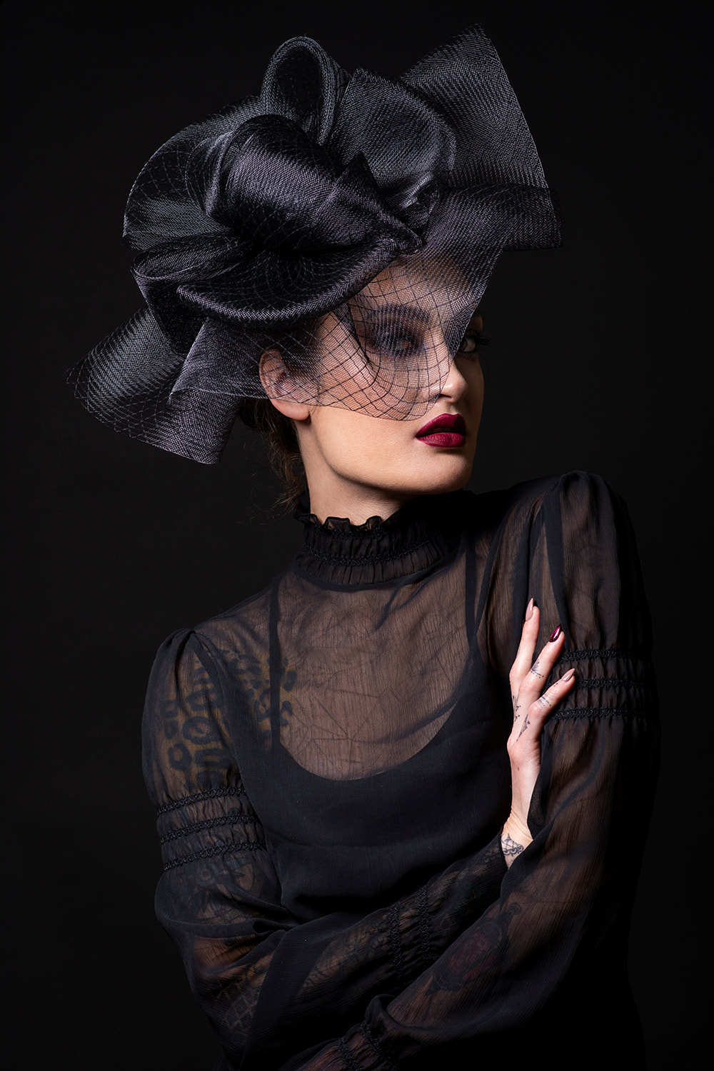 Fashion portrait with black hat